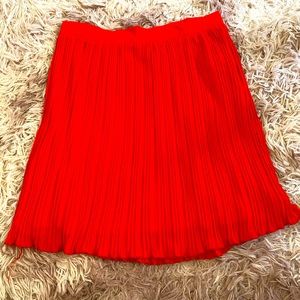 Bright red ruffled skirt